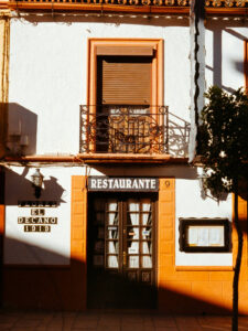 Street-level view of a small business in Spain illustrating the local market context for acquisitions