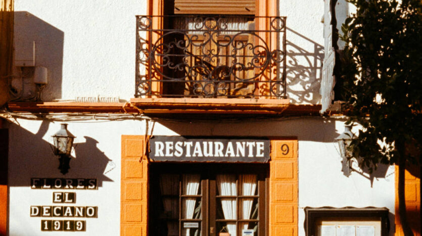 Street-level view of a small business in Spain illustrating the local market context for acquisitions