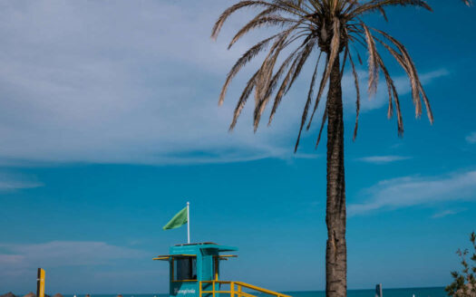 Tourists enjoying a sunny beach on the Costa del Sol in southern Spain